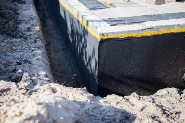 Professional Emergency Waterproofing technician working in Trussville, AL